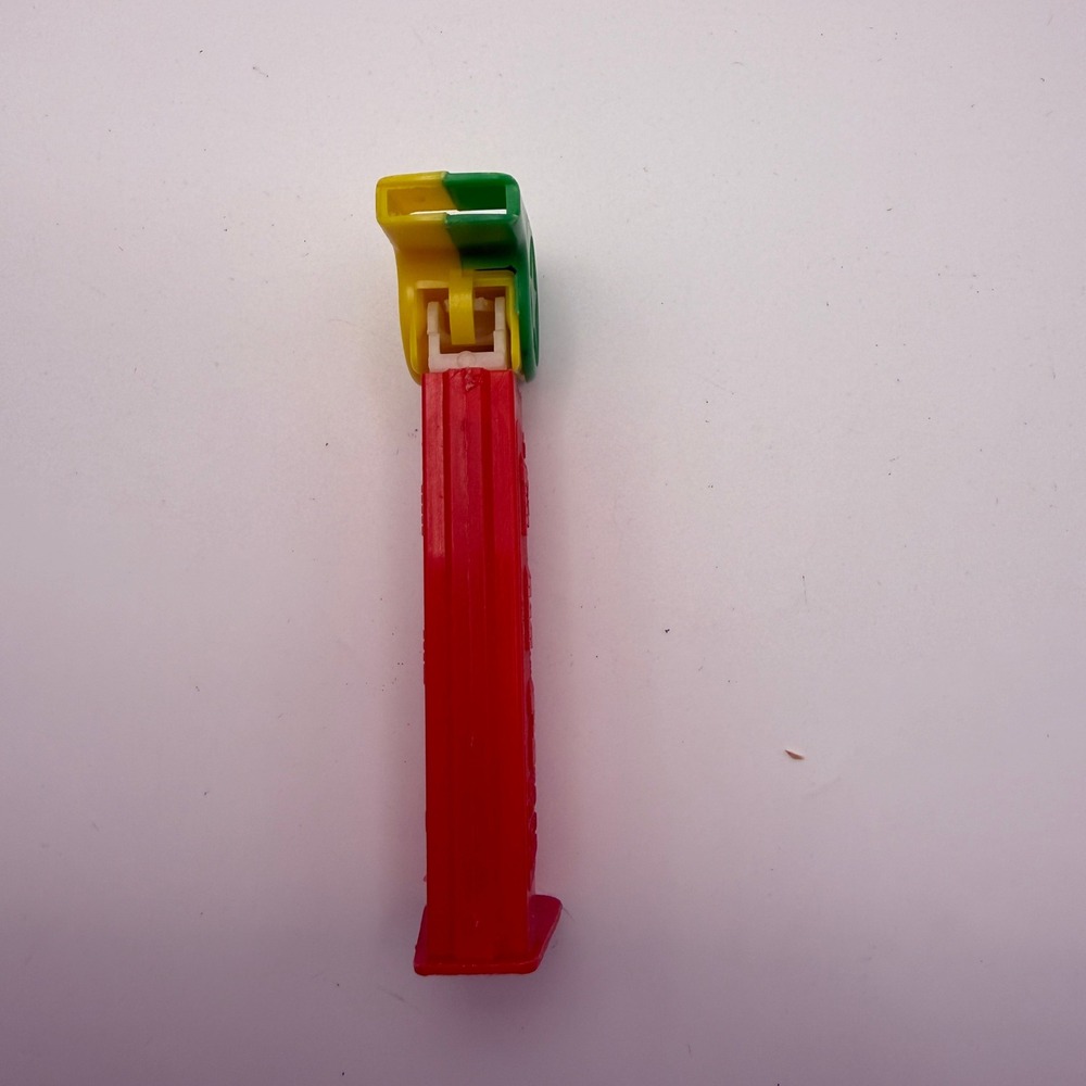 Vintage PEZ Candy Dispenser Whistle Head Red Stem Green Yellow Star Collectible